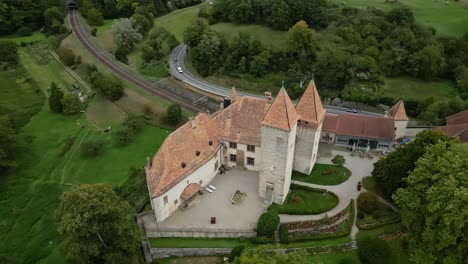 parallax drone shot right above beautiful la sarraz castle in vaud switzerland