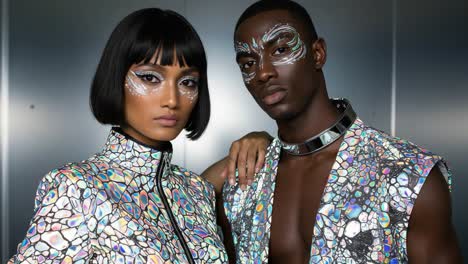 dazzling fashion showcase featuring stunning models with iridescent makeup and unique outfits, capturing the essence of modern style and creativity