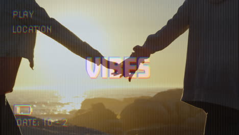 animation of text vibes over people by seaside