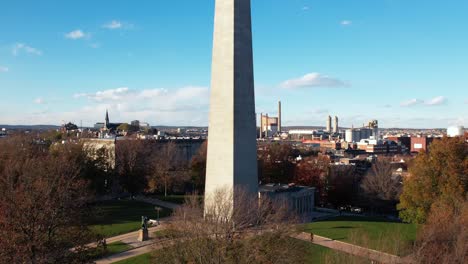 revealing aerial of bunker hill monument in boston massachusetts on a clear winter day