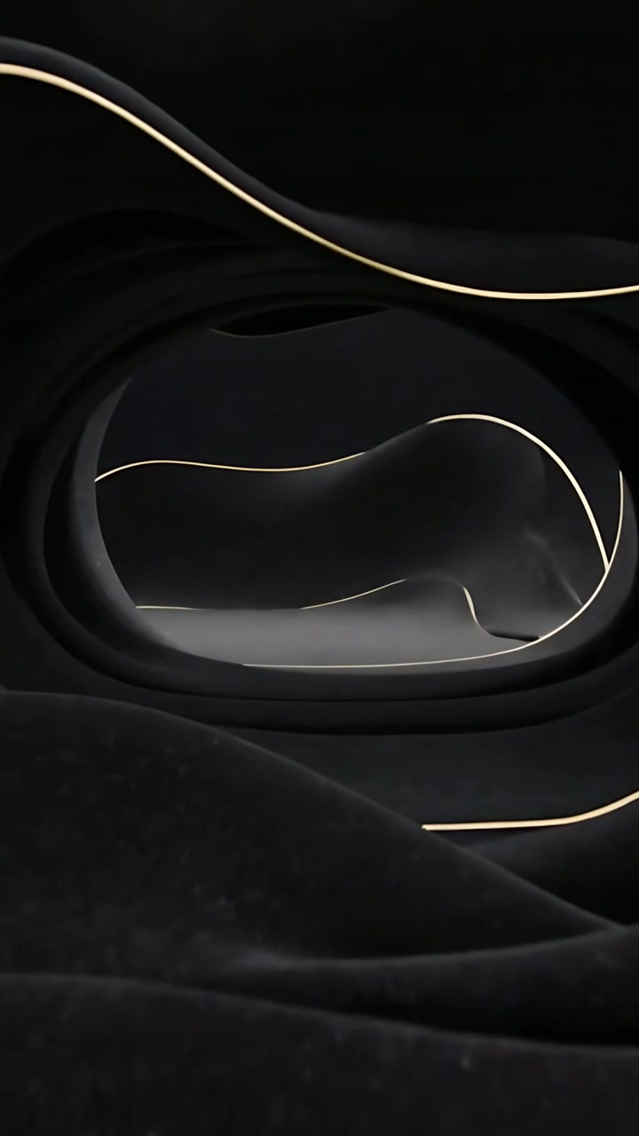 Vertical video: Moving camera revealing black shells in studio, highlighting gold trim and floor