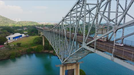 aerial view of the americas bridge heading towards the city