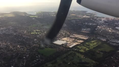 propeller aircraft in flight looking through window with aircraft point of view