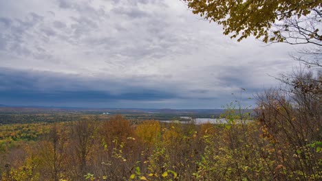 Timelapse-on-top-of-a-mountain-with-other-mountains-and-lakes