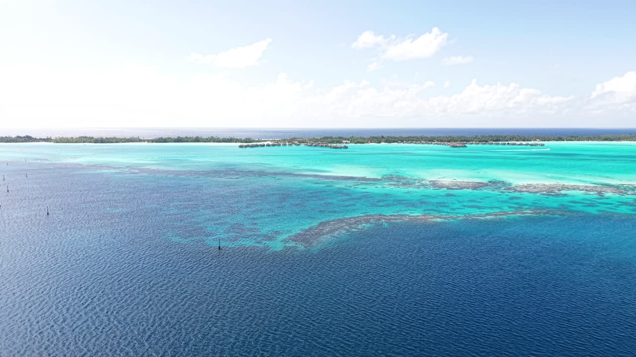 Bora Bora Island Lagoon, French Polynesia. Drone Shot of Turquoise Water and Coral Reefs