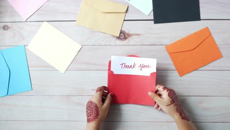 thank you note with envelopes and henna
