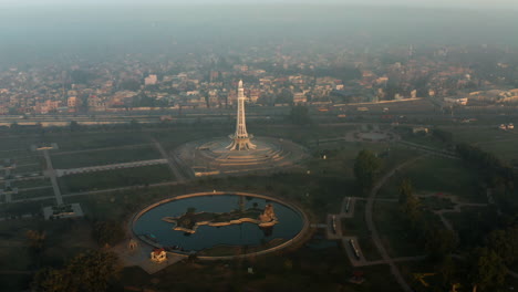 bird's eye view of greater iqbal park at sunrise in lahore, pakistan - aerial drone shot