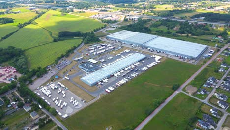 aerial view of warehouse storages or industrial factory or logistics center from above
