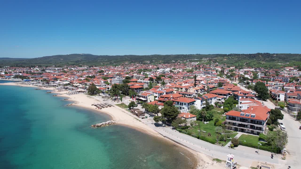 Nikiti Beach in Chalkidiki Greece, Aerial Point of Interest Shot, Summer Destination Coastal Village
