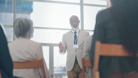 Presentation,-meeting-and-black-man-on-tablet