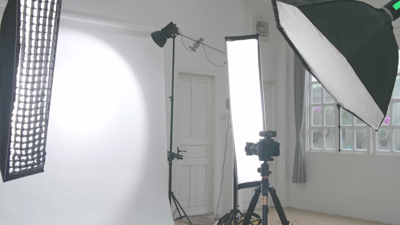 Empty Photo Studio With Lighting Equipment