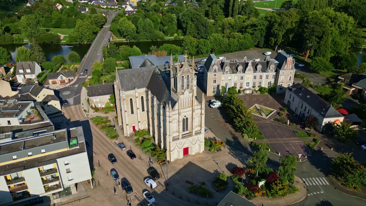 Saint-Pierre church in Changé, France. Aerial drone orbiting