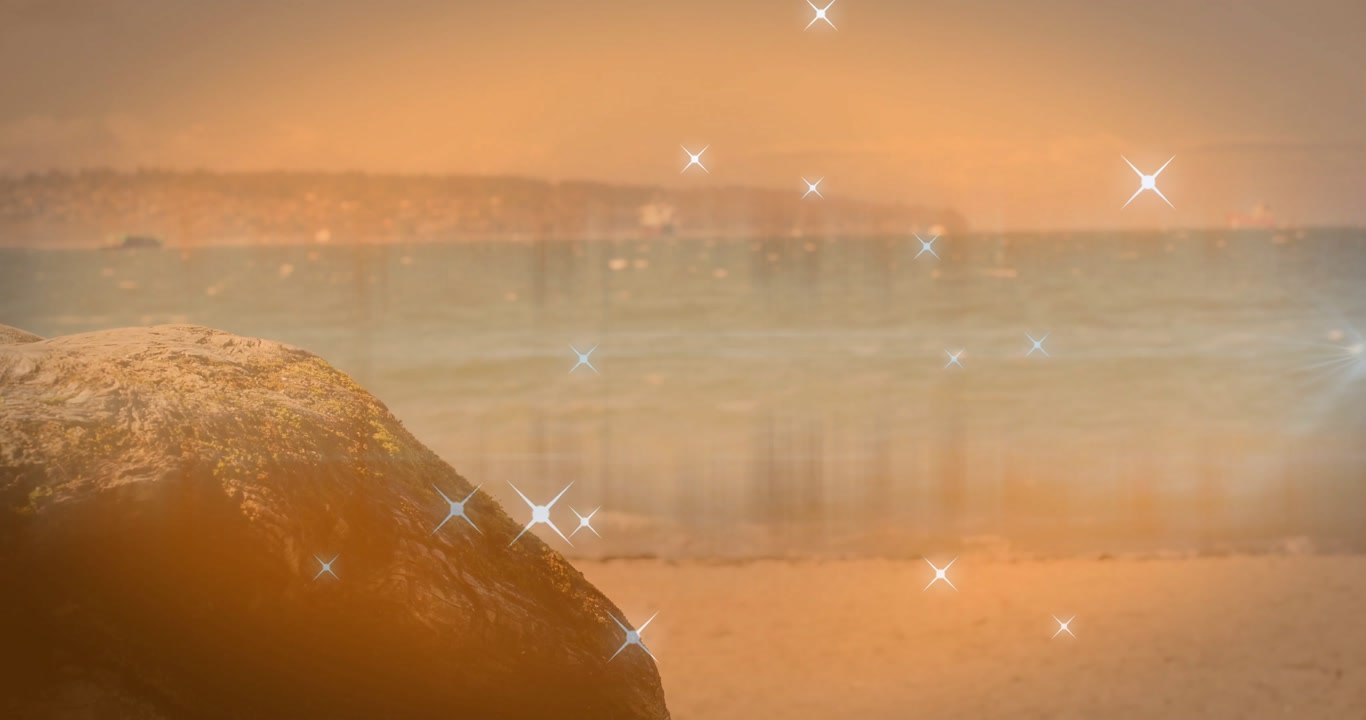 Sparkles appearing and drifting while pulsing over beach for dynamic background effect