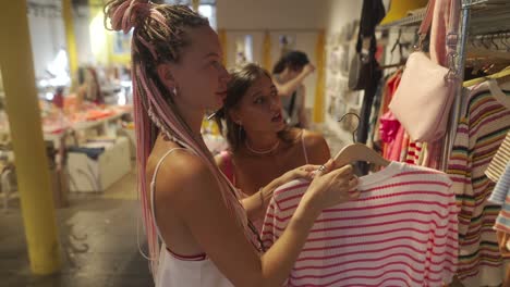 women shopping for clothes in a boutique