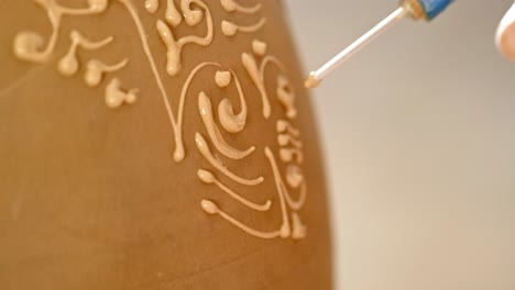 Hand-Decorating a Ceramic Pot