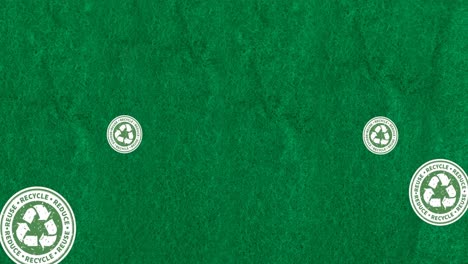 animation of recycling symbols floating on green background