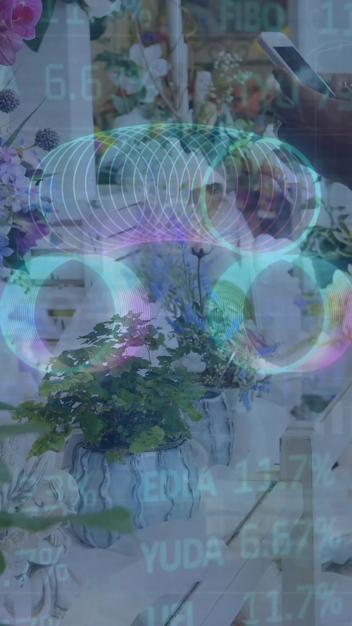 This video shows a female florist taking a picture of flowers with her mobile phone in a flower shop