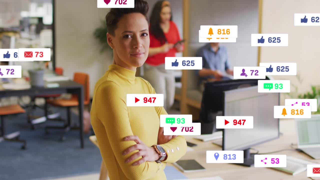 Animation of social media icons over biracial woman with crossed arms smiling at office