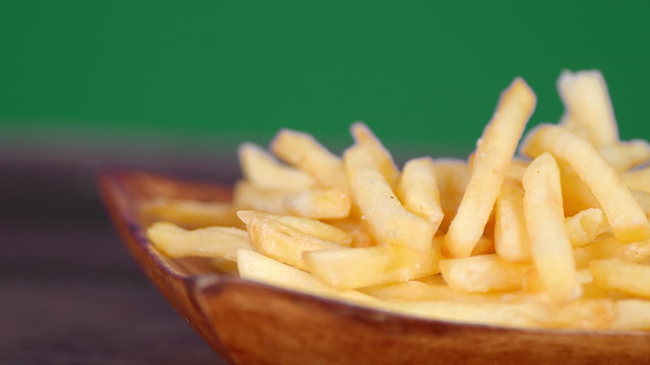 The fries on the plate slowly rotates.