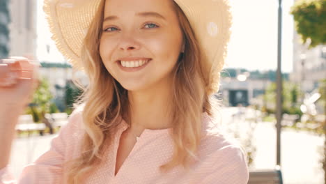 young woman in a straw hat