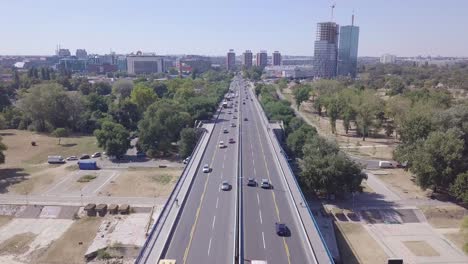 New-Belgrade-and-Branko-bridge-in-summer-day,-aerial-shot