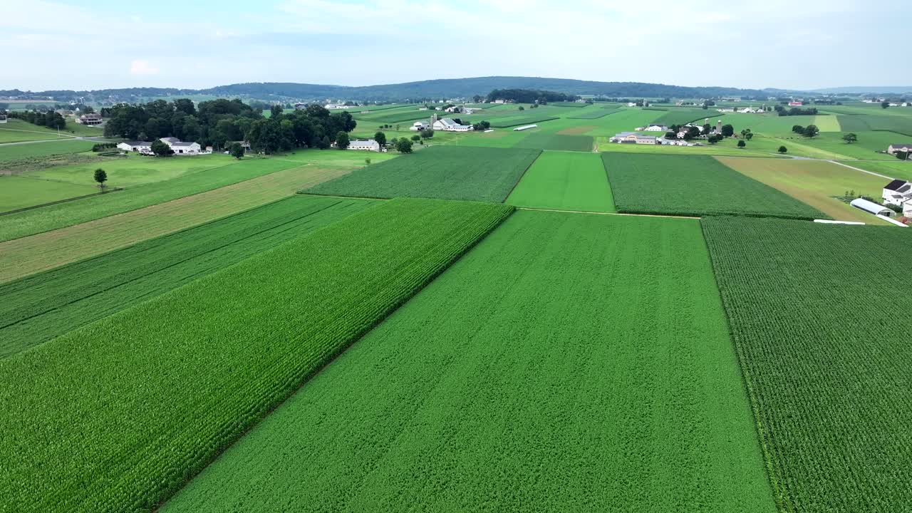 An aerial view of the lush green farmland of southern Lancaster County, Pennsylvania during the summer