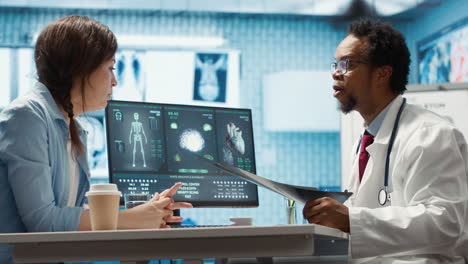 female patient listening to a diagnostic report from doctor based on mri results