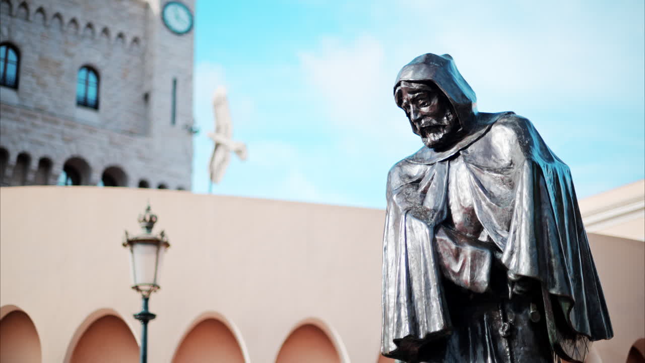 Monaco City, Monaco - October 4, 2024: Statue of Prince Francois Grimaldi with the Palace at background