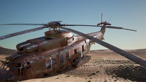 old rusted military helicopter in the desert at sunset