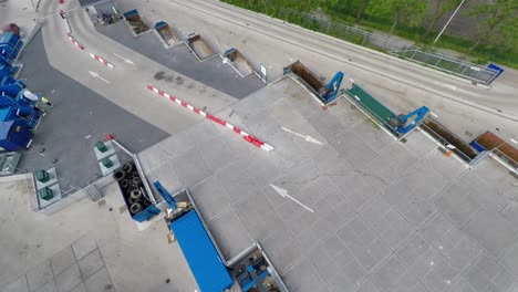 drone flying low over recycling plant