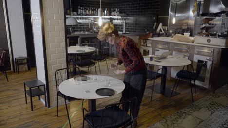 restaurant interior cleaning and table setting