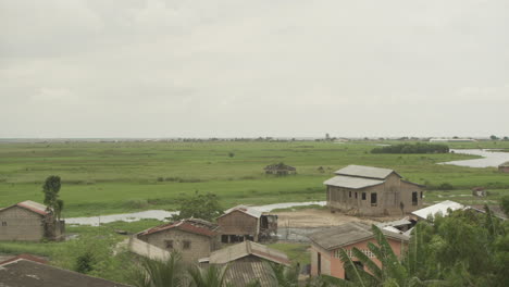 benin landscape and houses in flood zone by house