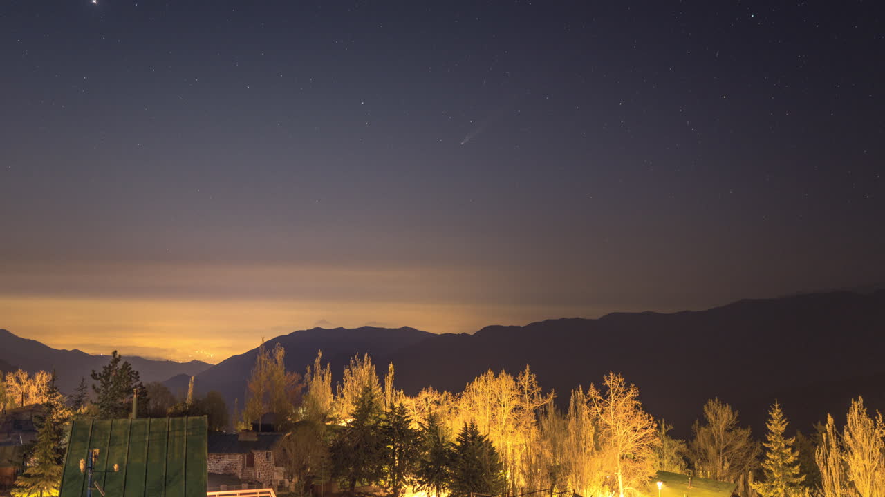 Stunning fixed camera hyperlapse of Santiago sunset with vivid colors over the Andes mountains and urban skyline