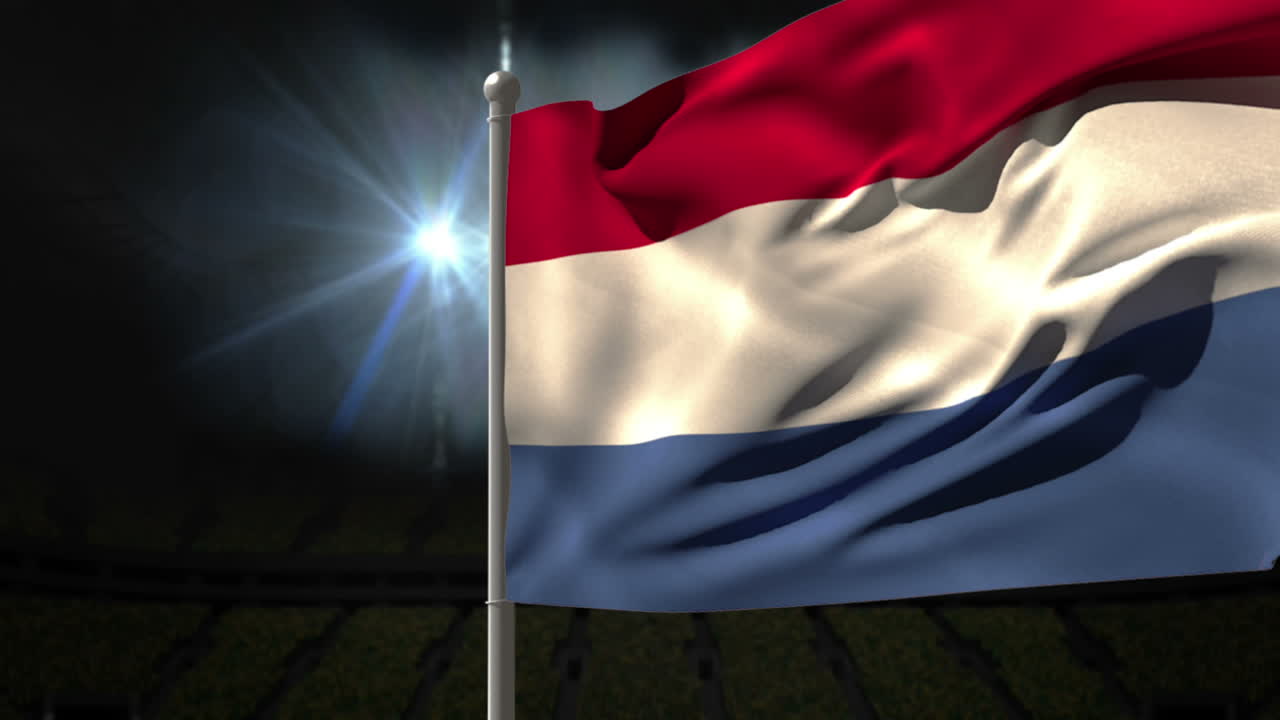 네덜란드 국기가 발 기둥에 흔들리고 있다
