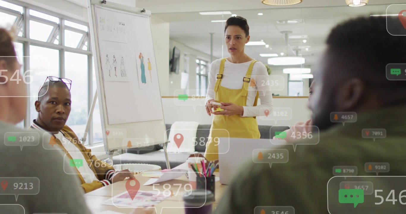 Presenter clicking remote and showing fashion sketches, overlays filling table, getting feedback