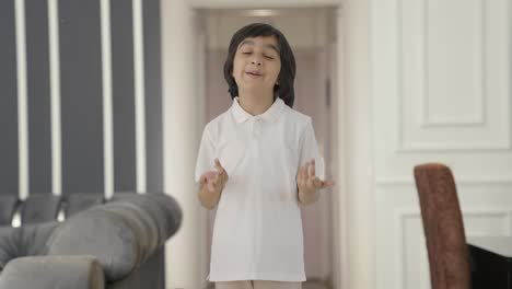 Happy-Indian-boy-talking-to-the-camera