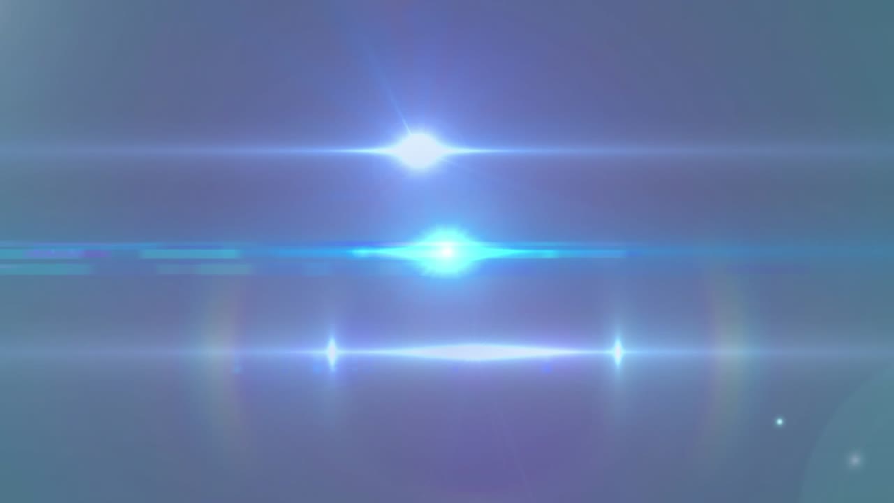 Bagliore centrale che si illumina da un debole punto blu, emettendo raggi e pulsando per mostrare il design