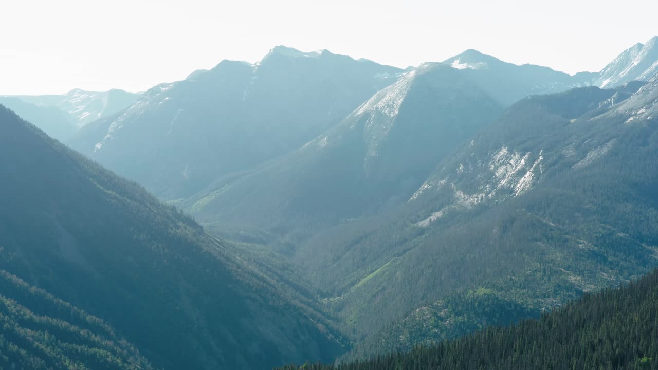 Tracking aerial shot of the peaks of the San Juan mountains.