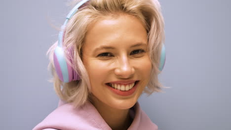 smiling woman with headphones