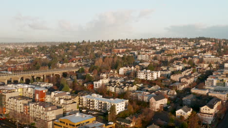 drone aerial push towards fremont neighborhood during sunrise