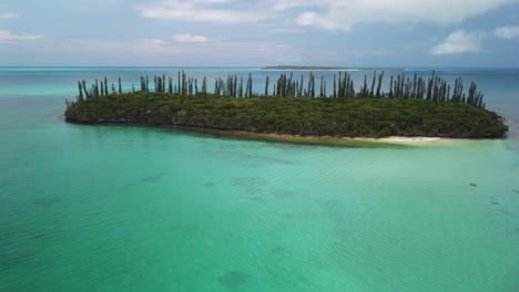 Aerial:-beautiful-desert-island-in-Pacific-Ocean,-New-Caledonia,-arc-shot