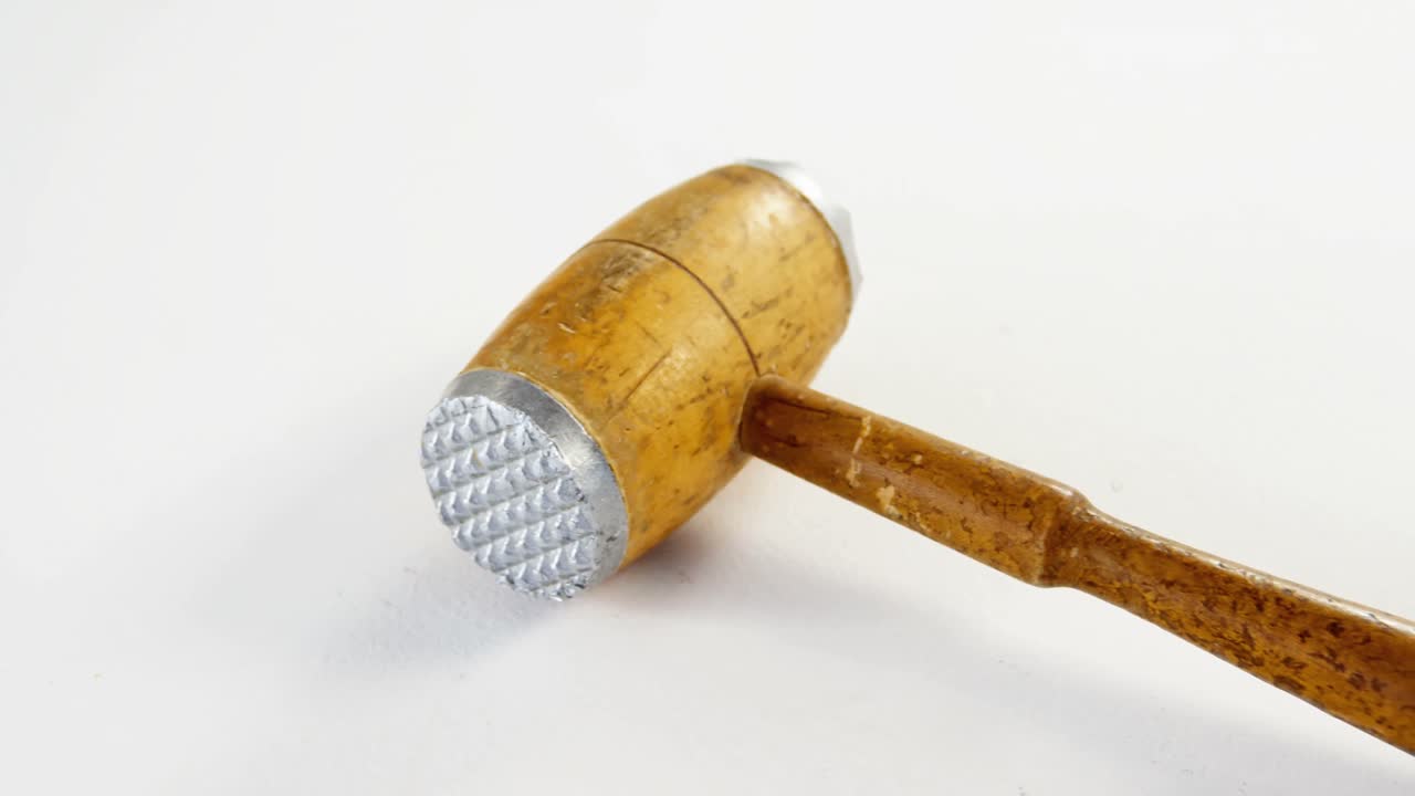 Close-up of meat tenderizer wooden hammer