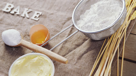 various ingredients and word bake on table 4k