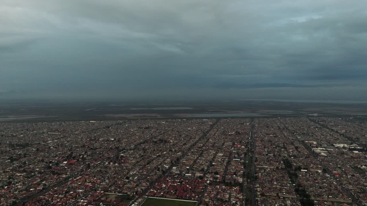 Drone film of rainy season over Ecatepec and vast metropolitan area