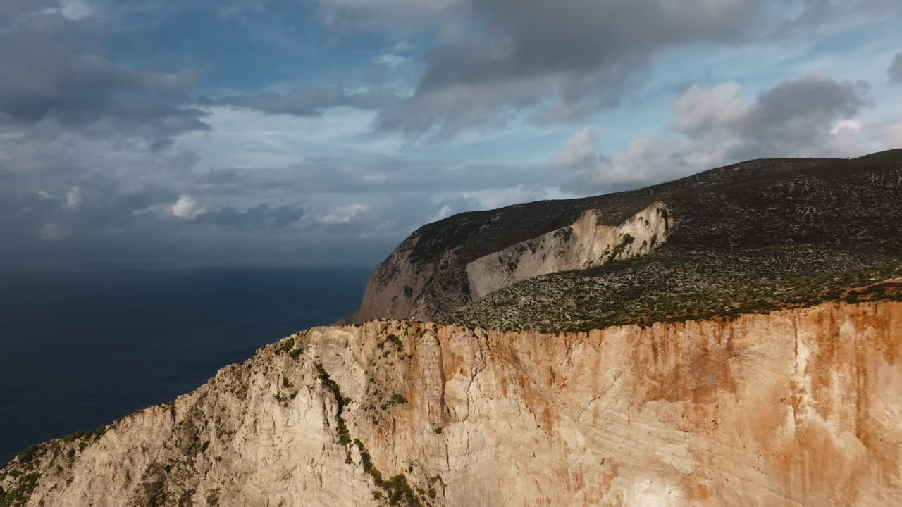 Coastal Cliffside View with Dramatic Clouds