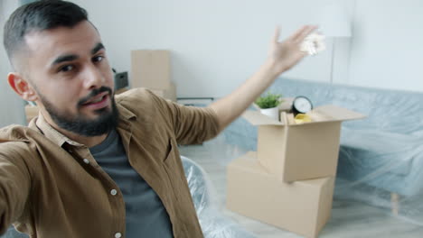 excited man moving into new home