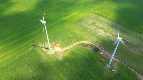 Aerial-view-of-powerful-Wind-turbine-farm-for-energy-production-on-beautiful-cloudy-sky-at-highland