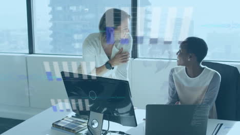 animation of graphs, globes over diverse female coworkers sharing ideas on desk in office