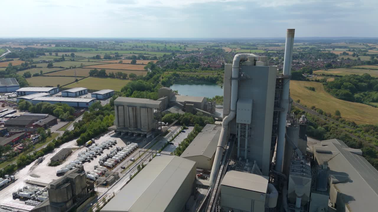 Aerial view of large aggregates plant and cement factory manufacturing site in Rugby England UK with industrial buildings