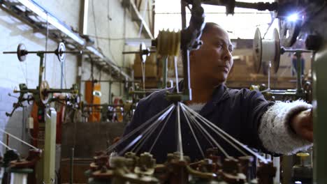 female worker working in rope making industry 4k